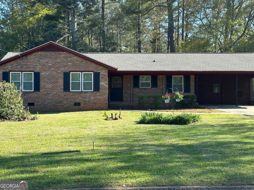 404 E NORTHWOODS DR, GRIFFIN, GA 30223, photo 1 of 13